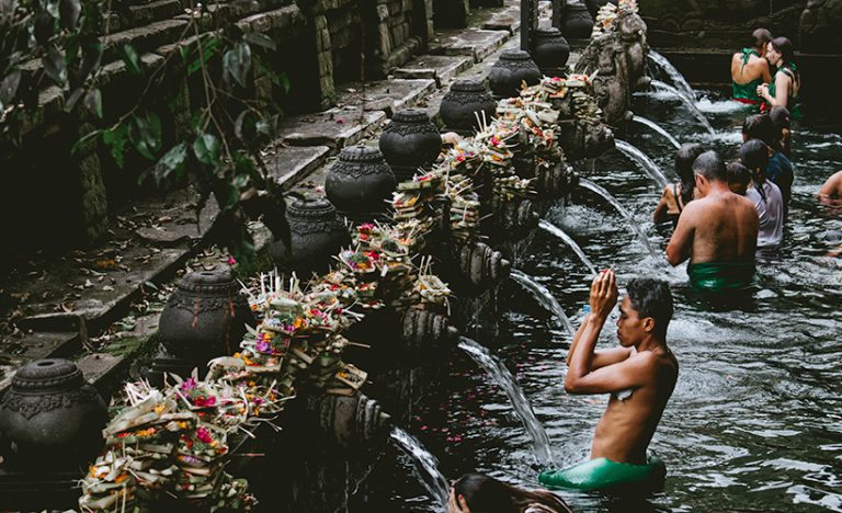 Bathing In The Holy Waters Of Bali’s Tirta Empul Temple, Indonesia