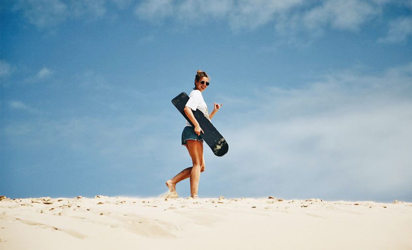 Slide down on a sandboard