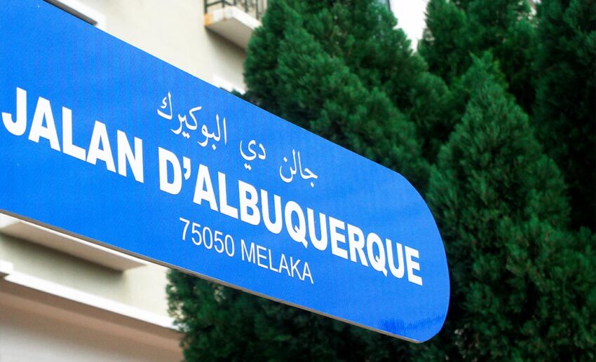 A blue and white Malaysian road sign for Jalan D’Albuquerque, named after the Portuguese explorer Afonso de Albuquerque in Melaka.